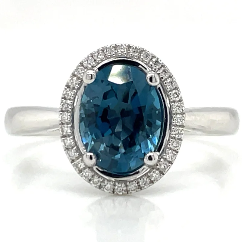 Topaz Gemstone Rings with a Faceted Cut and Shimmering Effect9ct White Gold Earth Grown 1.62ct London Blue Topaz And Diamond Halo Ring