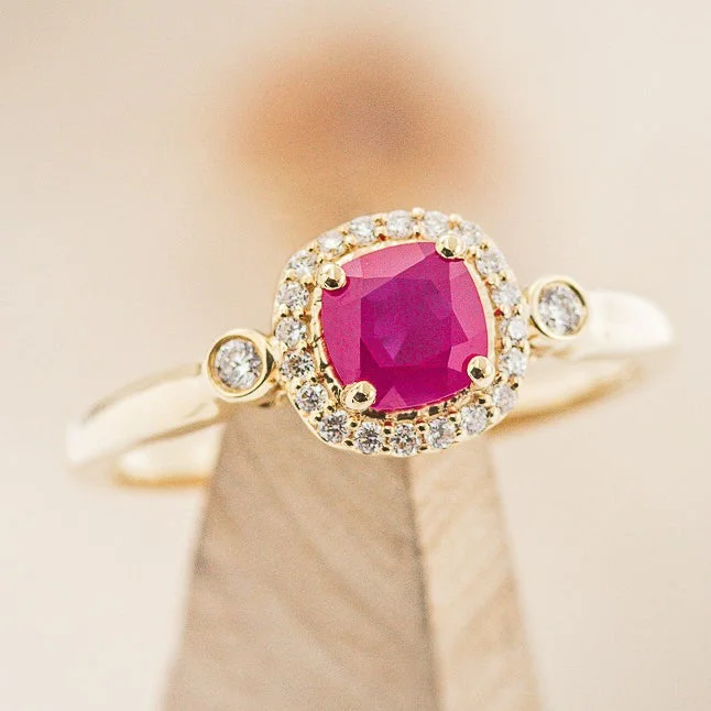 "CYRA" - CUSHION CUT LAB-GROWN RUBY ENGAGEMENT RING WITH DIAMOND HALO & ACCENTS