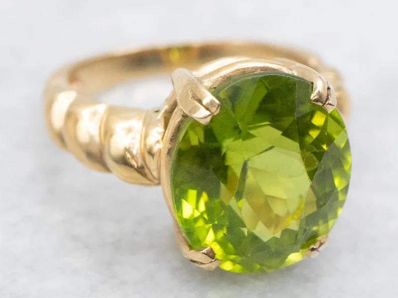 Peridot Gemstone Rings with a Floral - Motif BandBold Peridot and Curvaceous Gold Statement Ring