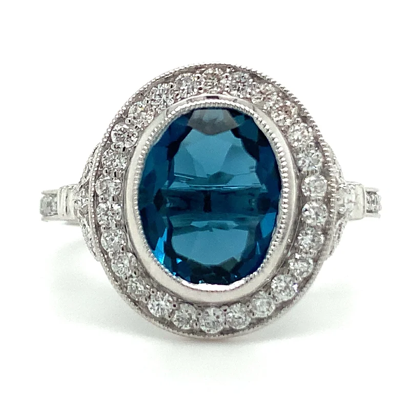 Garnet Gemstone Rings with a Vintage - Style Bezel Setting9ct White Gold Earth Grown Oval Cut 2.811ct London Blue Topaz & Diamond Halo Ring