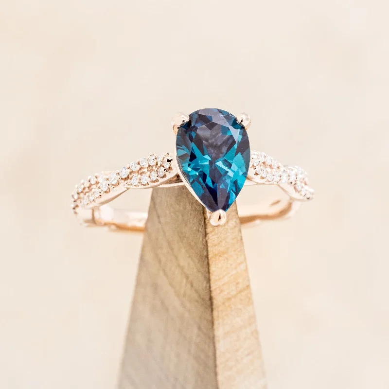 PEAR CUT LAB-GROWN ALEXANDRITE ENGAGEMENT RING WITH DIAMOND ACCENTS