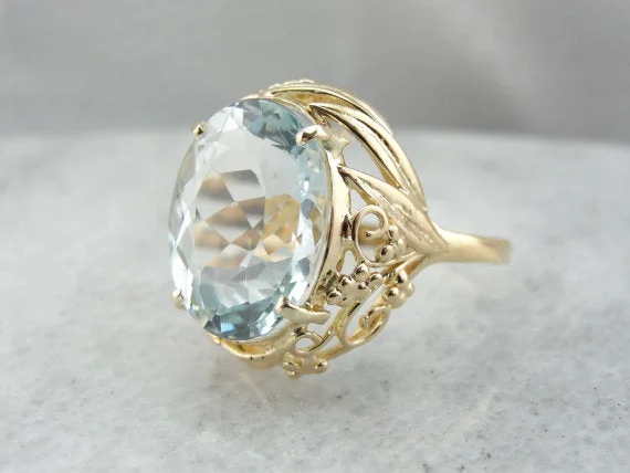 Sapphire Gemstone Rings in a Victorian - Inspired DesignFiligree Surrounds a Lovely Natural Blue Topaz