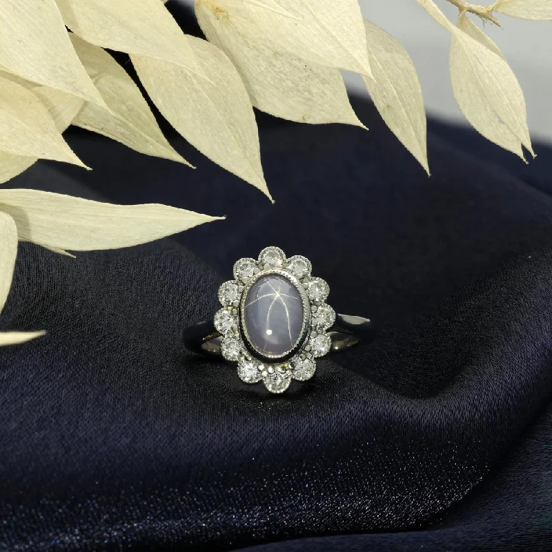 Peridot Gemstone Rings with a Floral - Motif BandPlatinum Star Sapphire & Diamond Ring