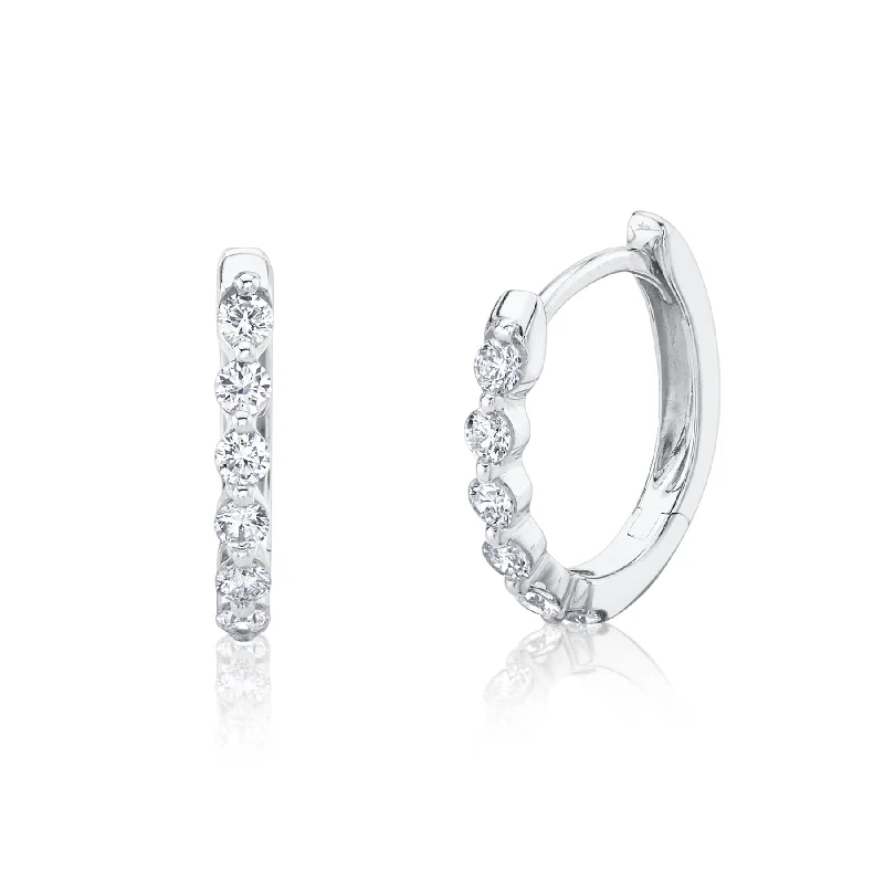 0.26CT DIAMOND OVAL HUGGIE EARRING