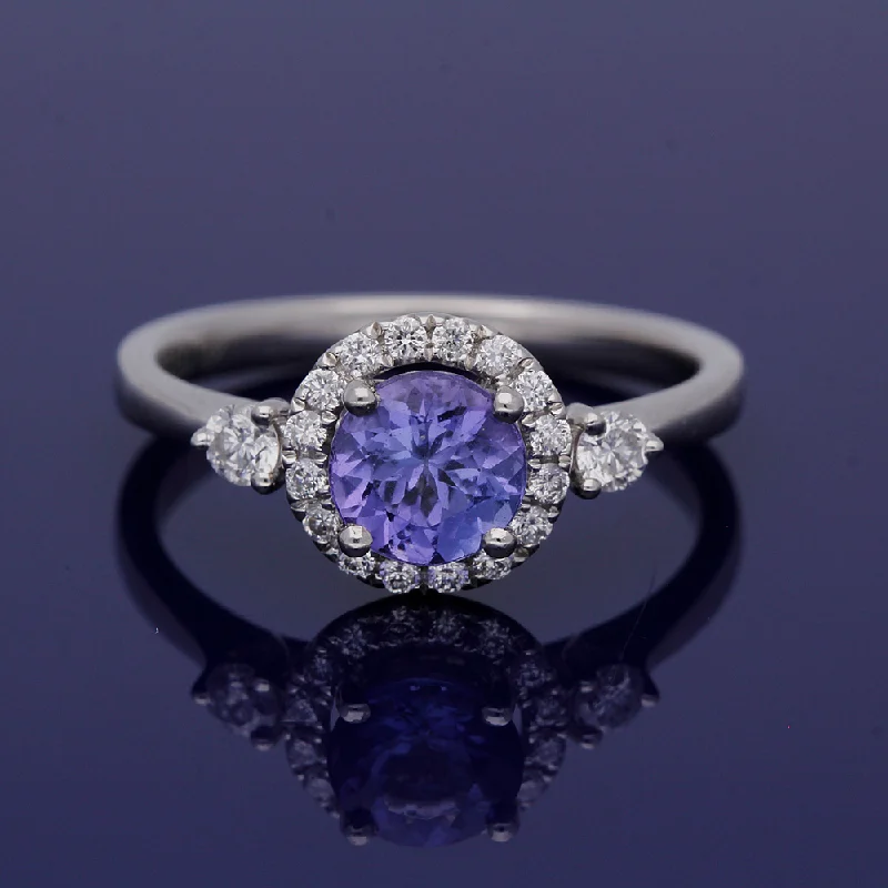 Aquamarine Gemstone Rings with a Nautical - Themed SettingPlatinum Tanzanite and Diamond Halo Ring