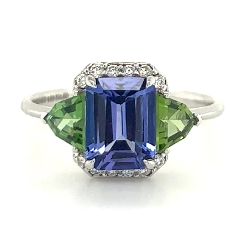 Peridot Gemstone Rings with a Floral - Motif BandEmerald Cut Tanzanite with Side Trillion Green Tourmaline in 18ct White Gold