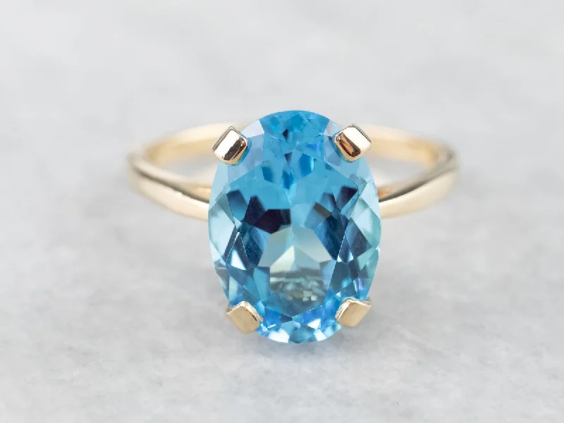 Alexandrite Gemstone Rings with a Chameleon - like Color ChangeYellow Gold Blue Topaz Cocktail Ring