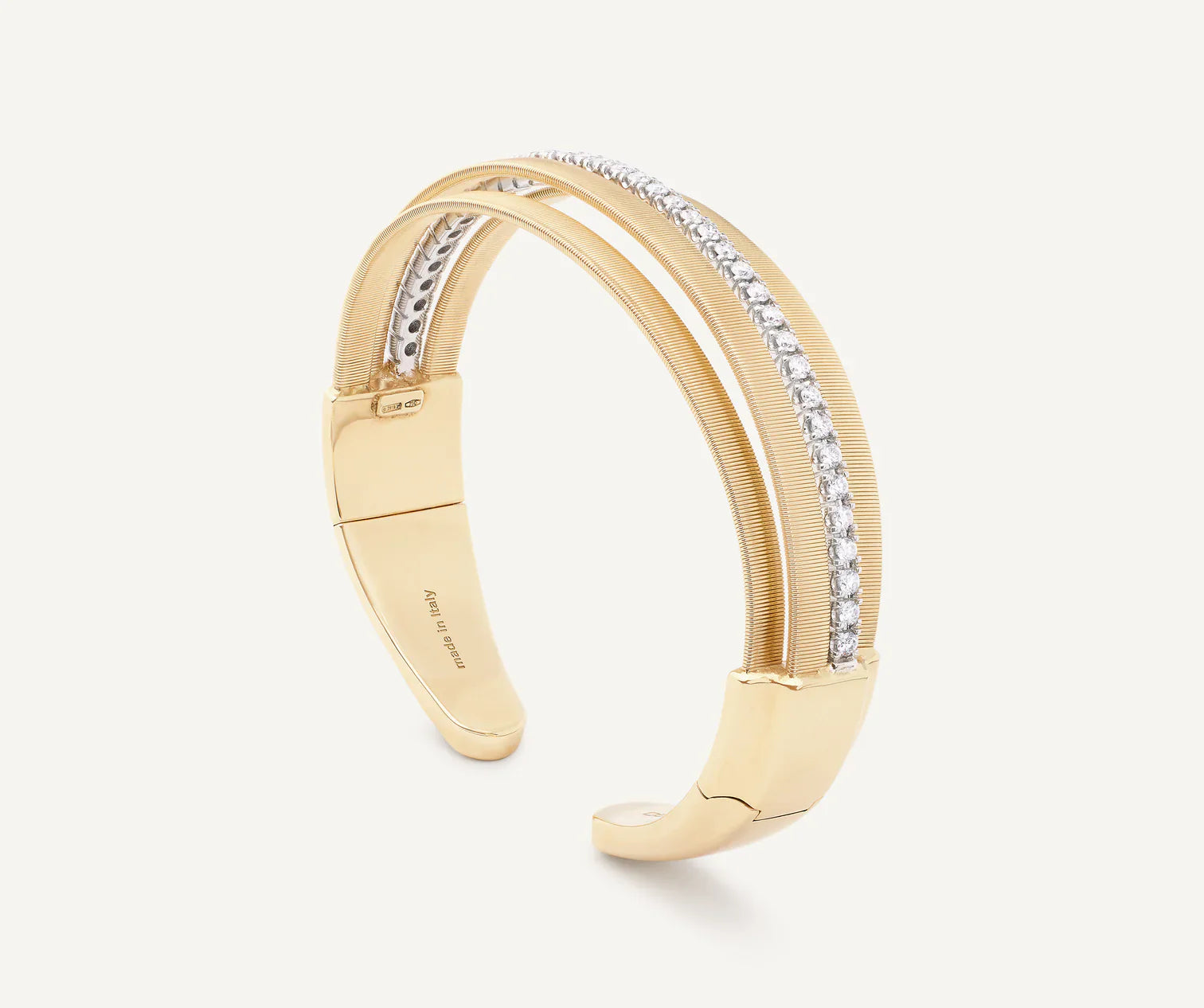 Sapphire - Inset Wedding Bands with a Royal Blue HueMarco Bicego Masai 18ct Yellow Gold Coil 0.95ct Diamond Bangle