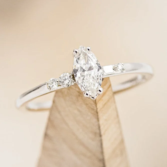 "JULIE" - MARQUISE MOISSANITE ENGAGEMENT RING WITH DIAMOND ACCENTS