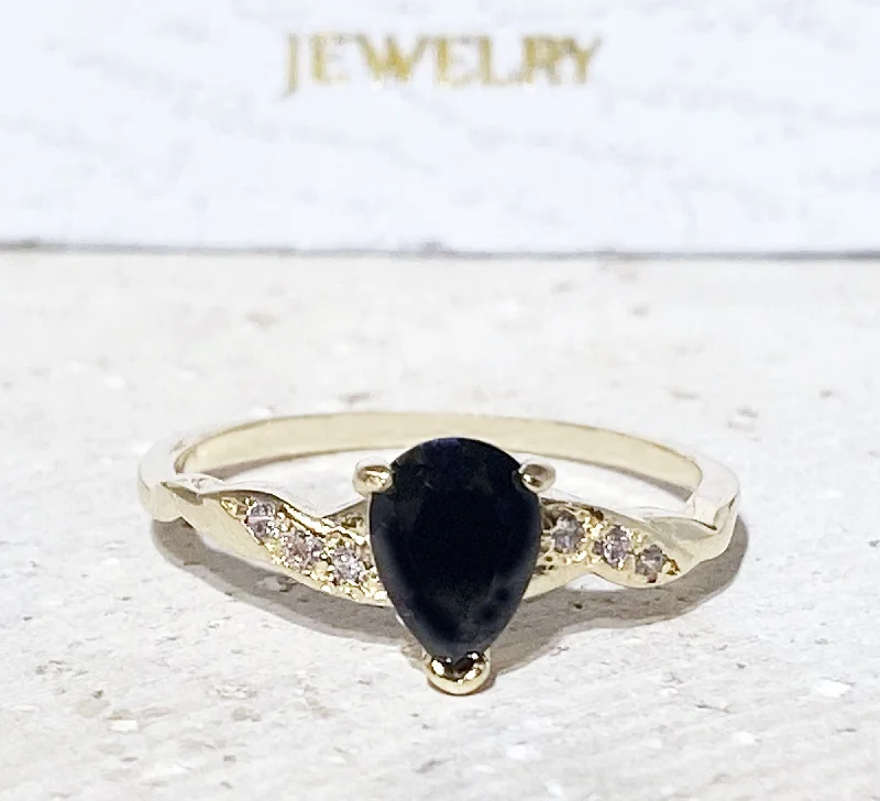 Turquoise Gemstone Rings with Native American - Inspired PatternsBlack Onyx Ring - December Birthstone - Delicate Ring with Pear Shape Black Onyx Center Gemstone and Clear Quartz Accents