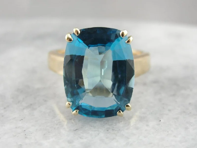 Ruby Gemstone Rings with Intricate Gold Filigree SettingsBig Blue Sea: Oversized Topaz Cocktail Ring