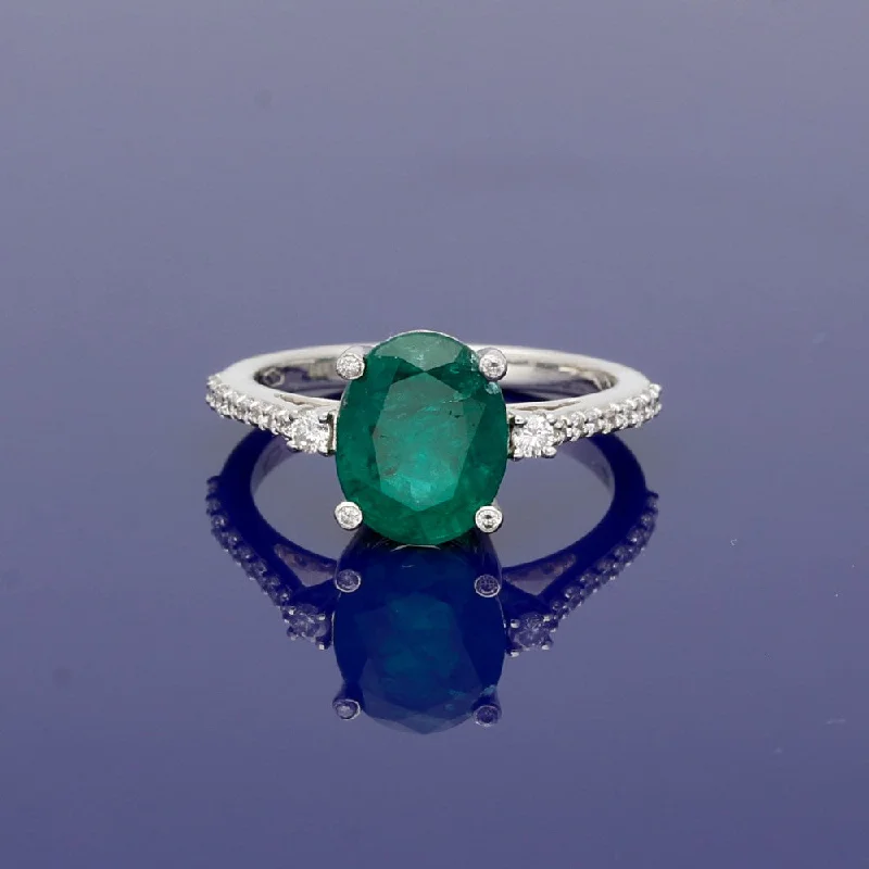 Topaz Gemstone Rings with a Faceted Cut and Shimmering Effect18ct White Gold Large Oval Emerald Ring with Diamond Shoulders