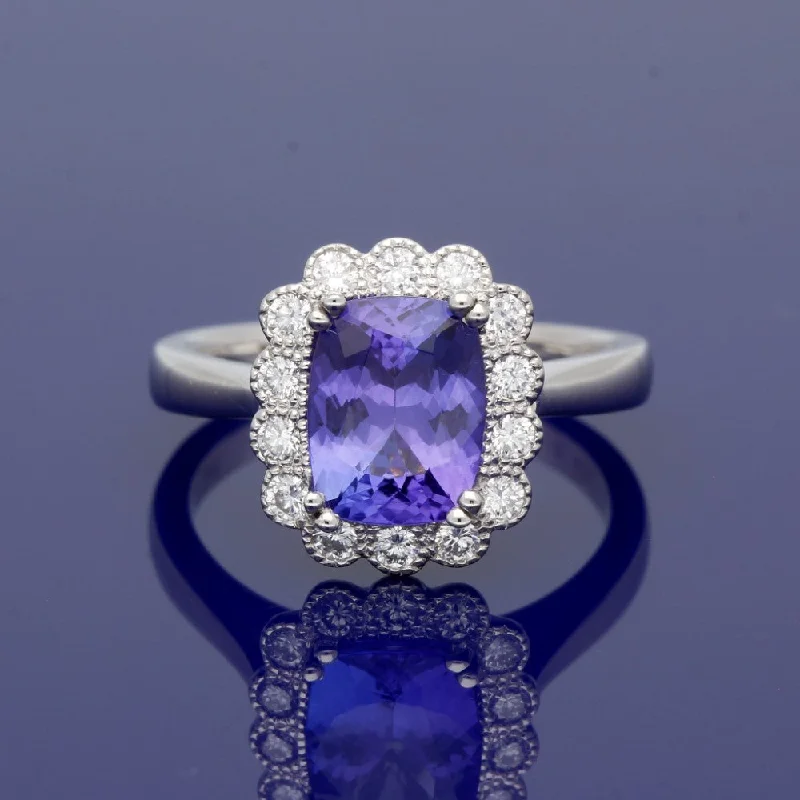 Emerald Gemstone Rings with Diamond - Encrusted HalosPlatinum Tanzanite & Diamond Cluster Ring