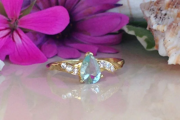 Garnet Gemstone Rings with a Vintage - Style Bezel SettingAquamarine Ring - March Birthstone - Tiny Delicate Ring with Pear-Shaped Aquamarine and Clear Quartz Accents