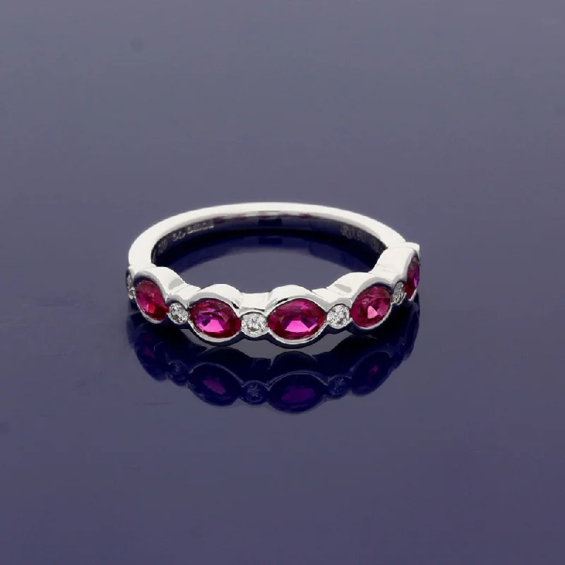 Opal Gemstone Rings with a Rainbow - Hued Play of Color18ct White Gold Oval Ruby & Diamond Rub Over Set Half Eternity Ring