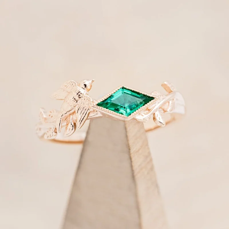 "SPARROW" - LOZENGE CUT LAB-GROWN EMERALD ENGAGEMENT RING WITH SPARROW EMBELLISHMENT