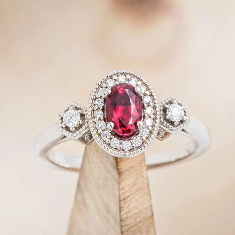 "AMELIA" - OVAL LAB-GROWN RUBY ENGAGEMENT RING WITH DIAMOND HALO & ACCENTS