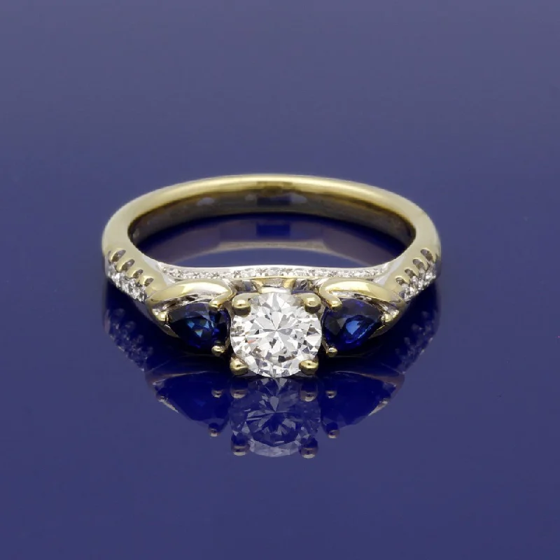 Tanzanite Gemstone Rings with Platinum Milgrain Detailing18ct Yellow Gold Diamond & Teardrop Sapphire Trilogy Ring