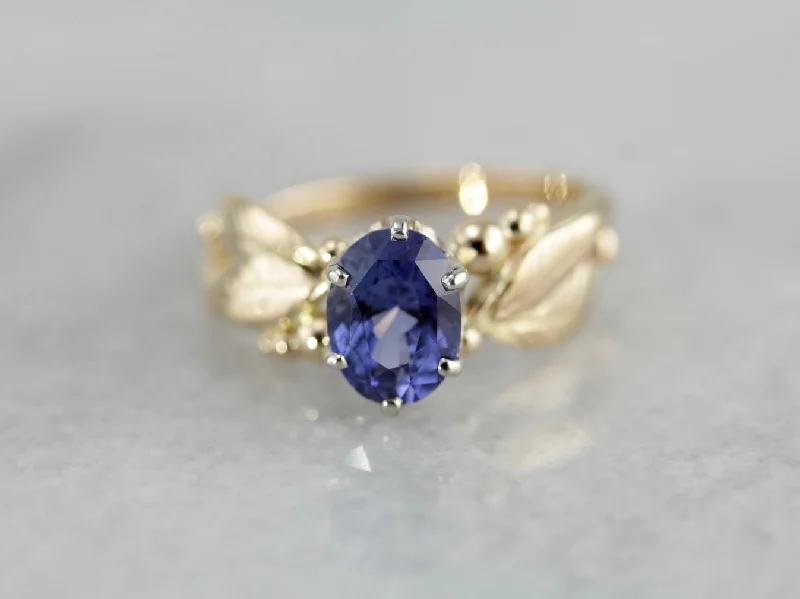 Jade Gemstone Rings with Intricate CarvingsIndigo Sapphire Gemstone set in a Vintage Leaf and Berry, Botanical Themed Setting